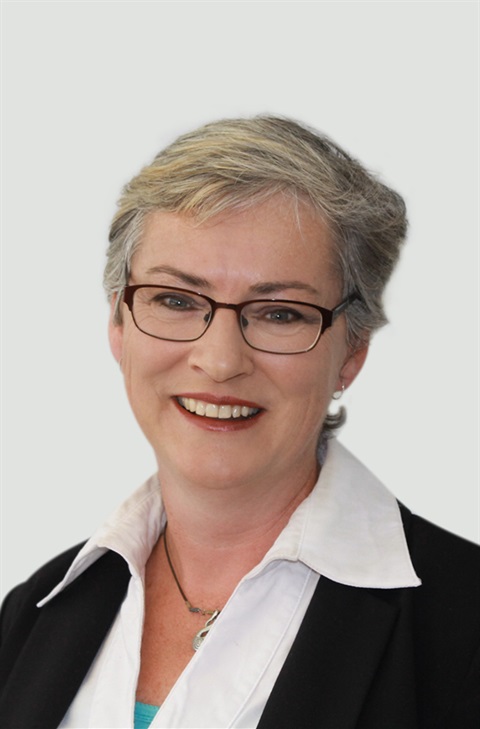 Portrait of Mayor Amanda Findley with grey background
