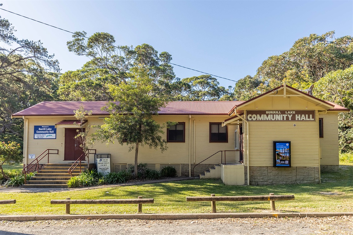 The front of Burrill Lake Community Hall with signage and Community Information Hub screen.