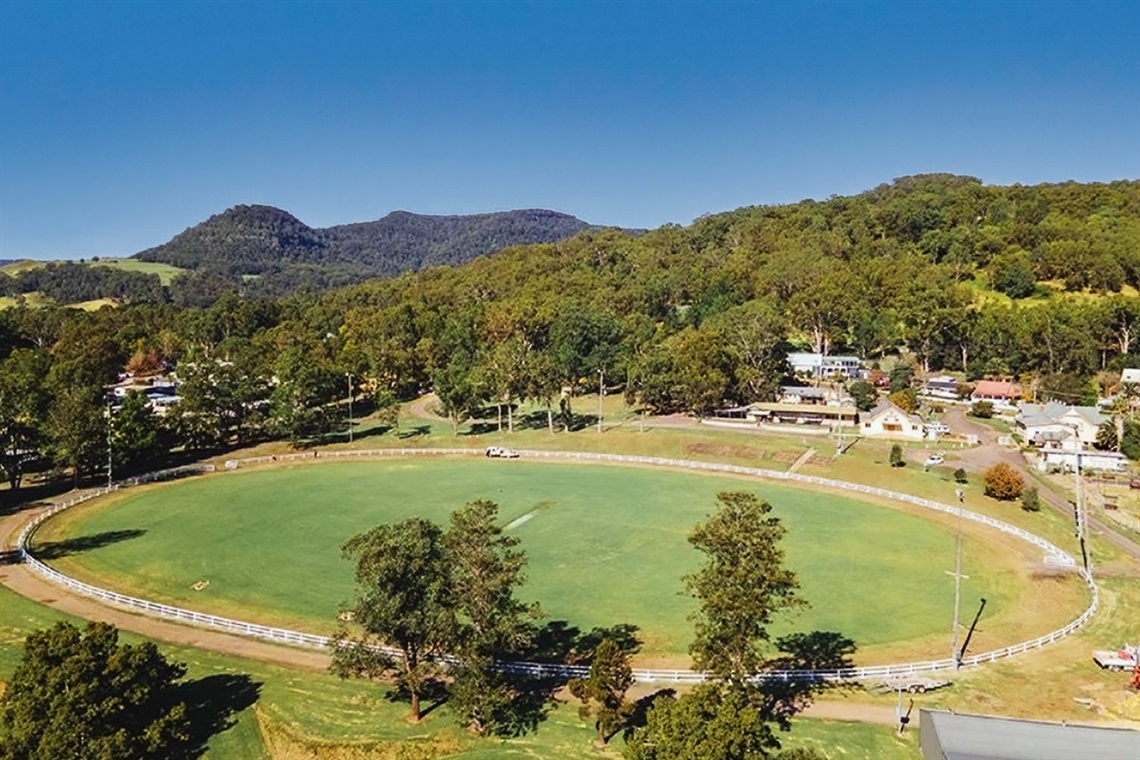 An aerial view of Kangaroo Valley Showground's Main Arena The mountains can be seen in the distance. 