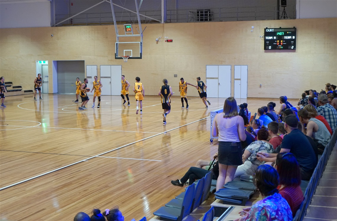 Teenagers playing basketball at Shoalhaven Indoor Sports Centre